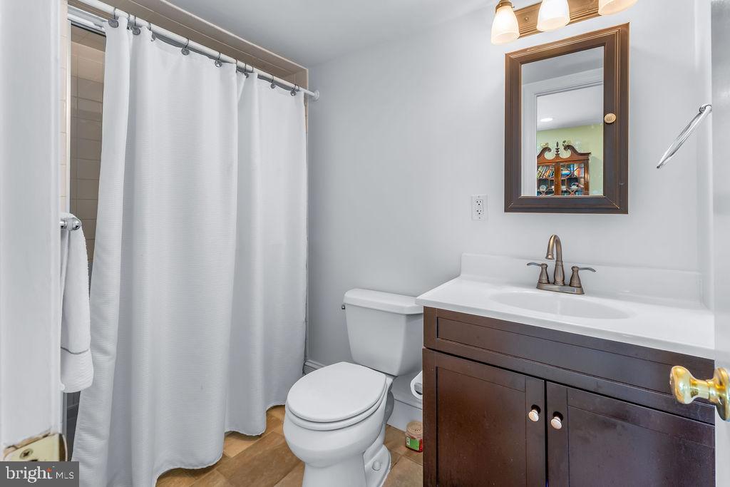 1329 Gresham Road Silver Spring, MD 20904 - Photo 39 of 56 a bathroom with a sink and a toilet
