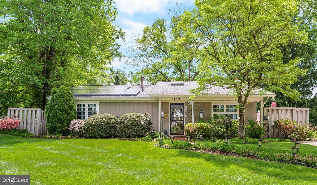 1329 Gresham Road Silver Spring, MD 20904 - Photo 4 of 56 a front view of a house with a yard