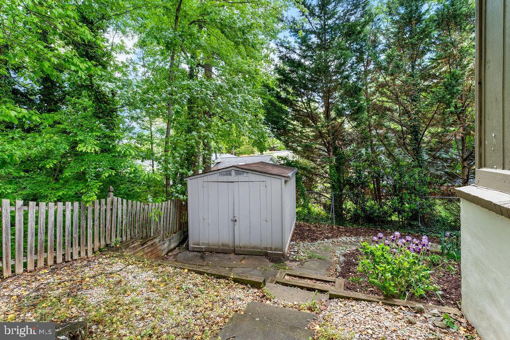 1329 Gresham Road Silver Spring, MD 20904 - Photo 53 of 56 a backyard of a house with plants and tree
