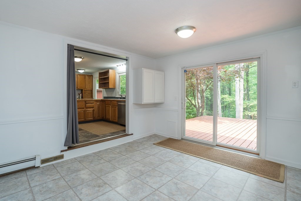 80 Goodell Street Belchertown, MA 01007 - Photo 13 of 40 an empty room with windows and entrance
