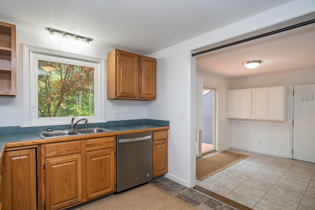 80 Goodell Street Belchertown, MA 01007 - Photo 14 of 40 a kitchen with a sink cabinets and window