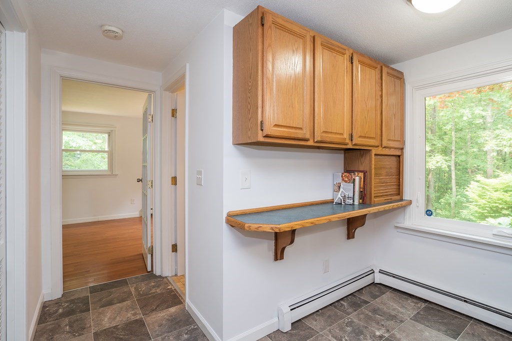 80 Goodell Street Belchertown, MA 01007 - Photo 17 of 40 a view of a storage and utility room with a window