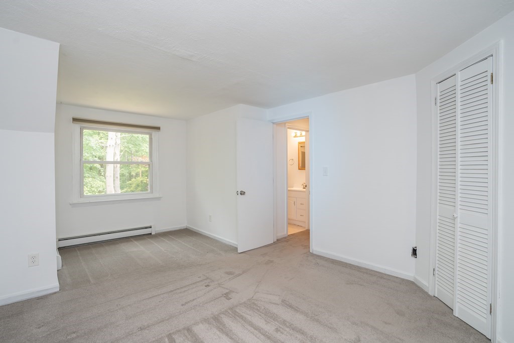 80 Goodell Street Belchertown, MA 01007 - Photo 27 of 40 a view of an empty room with a window
