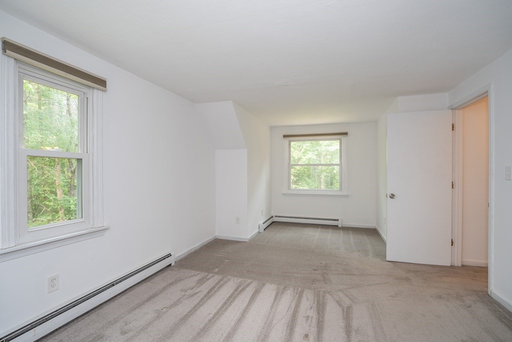 80 Goodell Street Belchertown, MA 01007 - Photo 28 of 40 a view of an empty room with a window