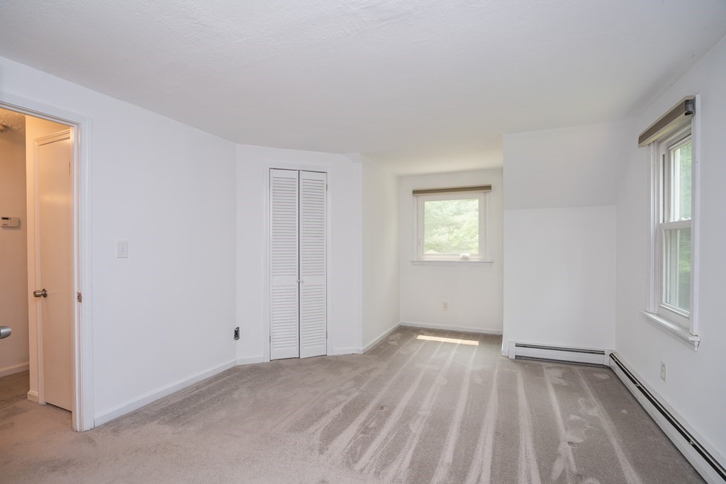 80 Goodell Street Belchertown, MA 01007 - Photo 30 of 40 an empty room with windows