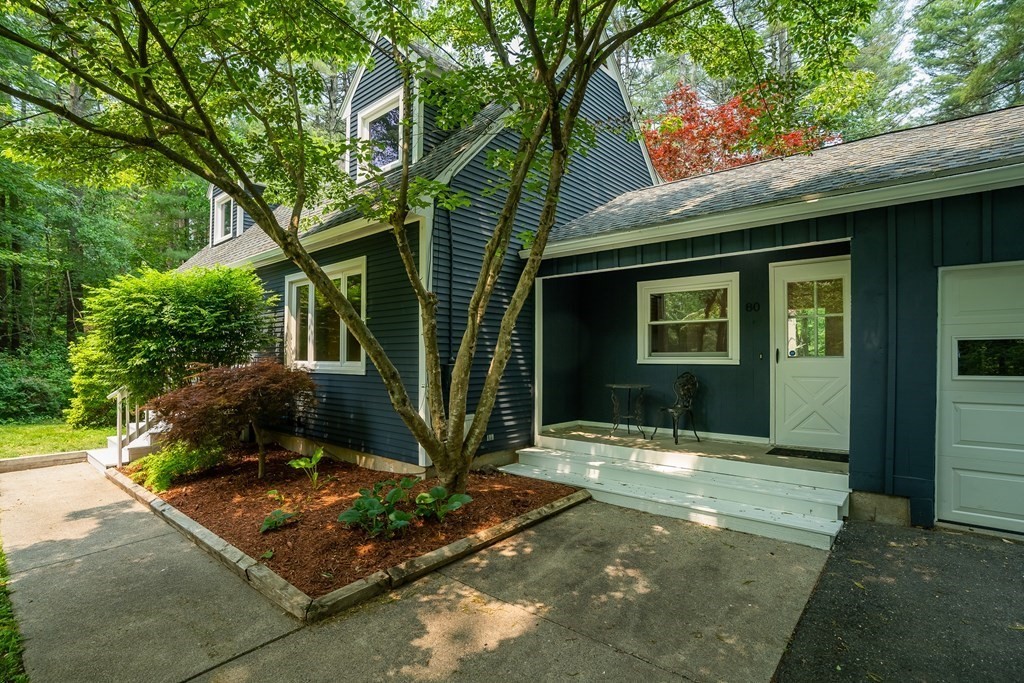 80 Goodell Street Belchertown, MA 01007 - Photo 3 of 40 a front view of a house with garden