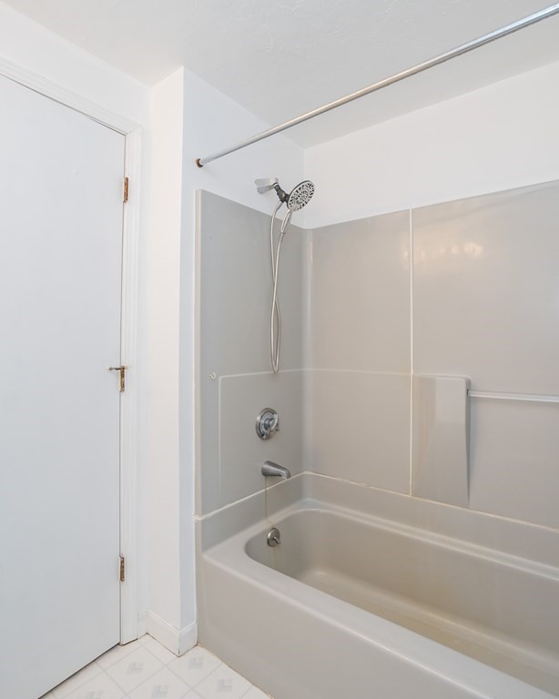 80 Goodell Street Belchertown, MA 01007 - Photo 32 of 40 a bathroom with a bathtub and a shower