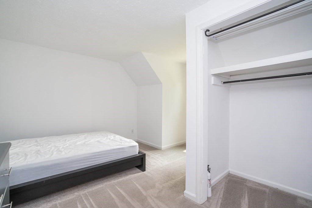 80 Goodell Street Belchertown, MA 01007 - Photo 35 of 40 a bedroom with a bed and a window