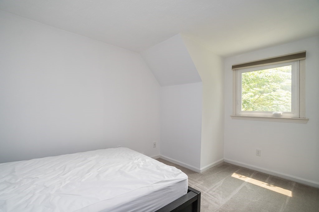80 Goodell Street Belchertown, MA 01007 - Photo 36 of 40 a room with a bed and a window
