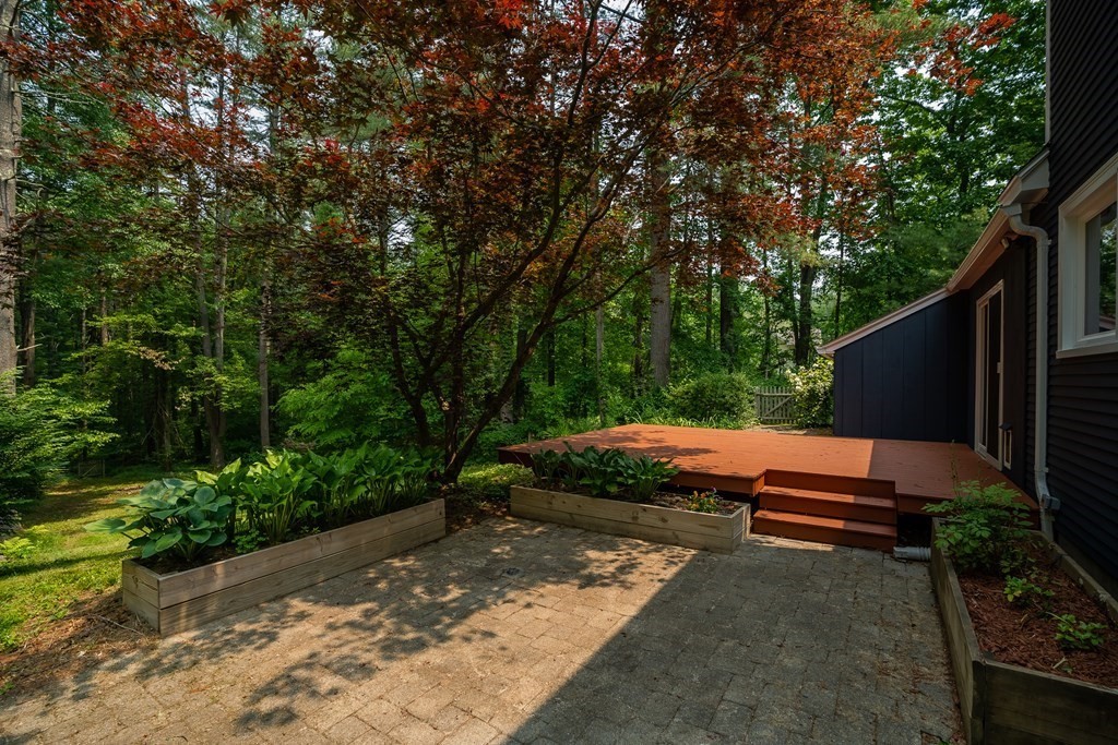 80 Goodell Street Belchertown, MA 01007 - Photo 7 of 40 a backyard of a house with a yard and outdoor seating