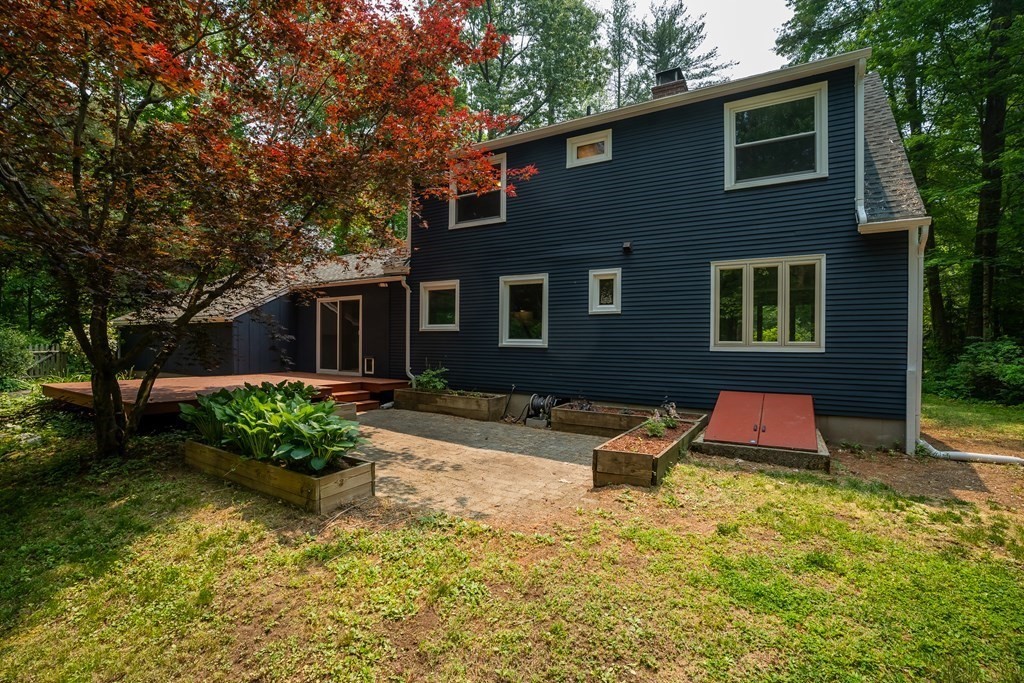 80 Goodell Street Belchertown, MA 01007 - Photo 8 of 40 a front view of a house with garden