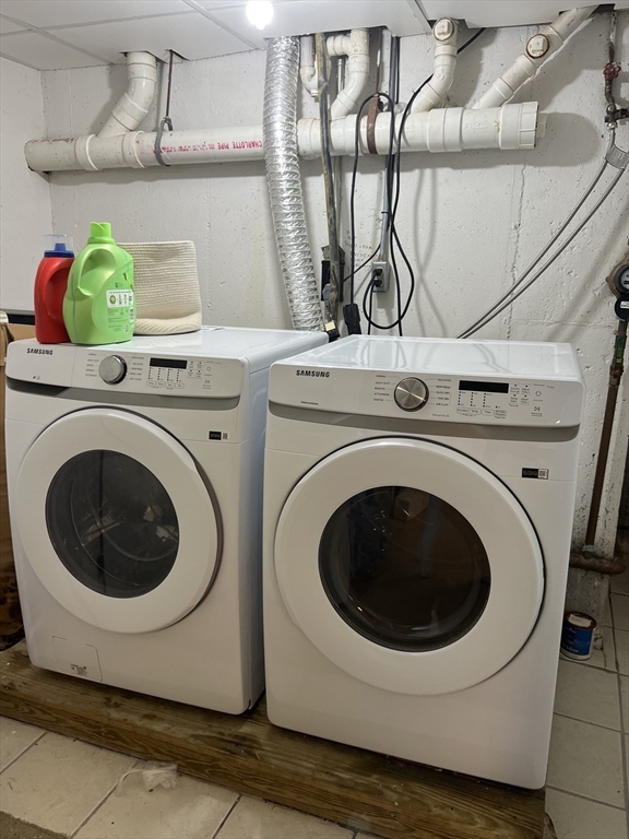 46 Suomi Road, Unit 46 Quincy, MA 02169 - Photo 9 of 16 a utility room with dryer and washer