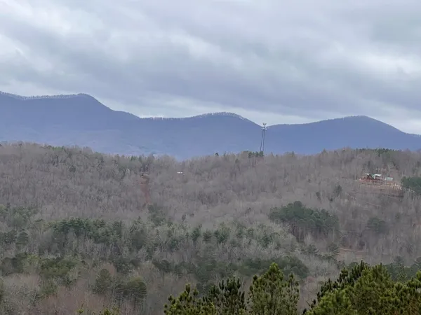 a view of mountains and valleys