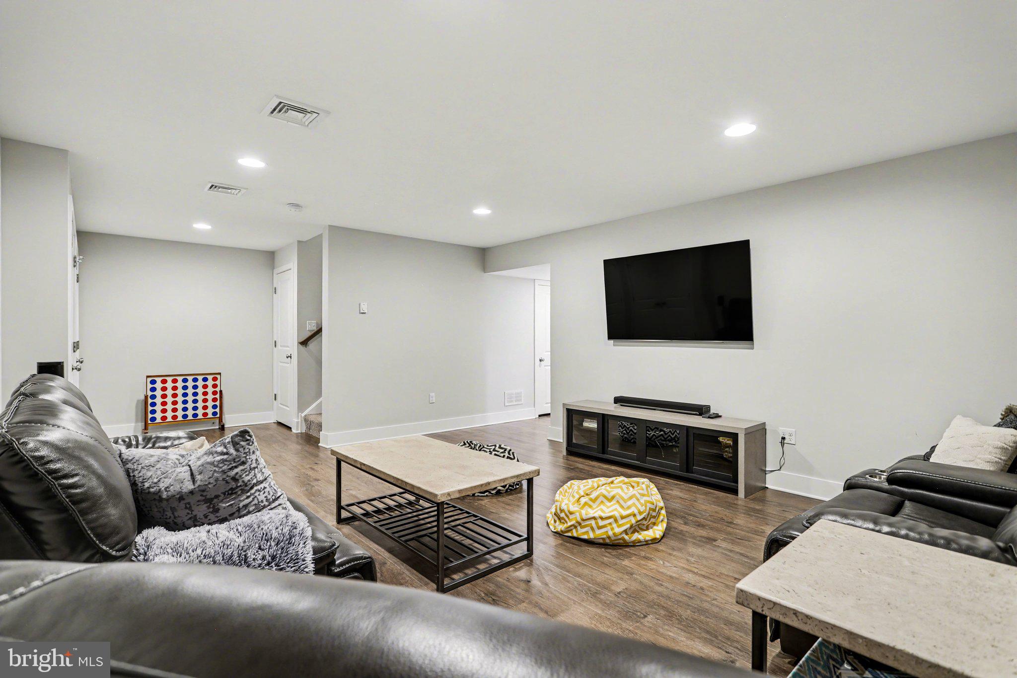 401 Wendover Way Lancaster, PA 17603 - Photo 19 of 45 a living room with furniture and a flat screen tv
