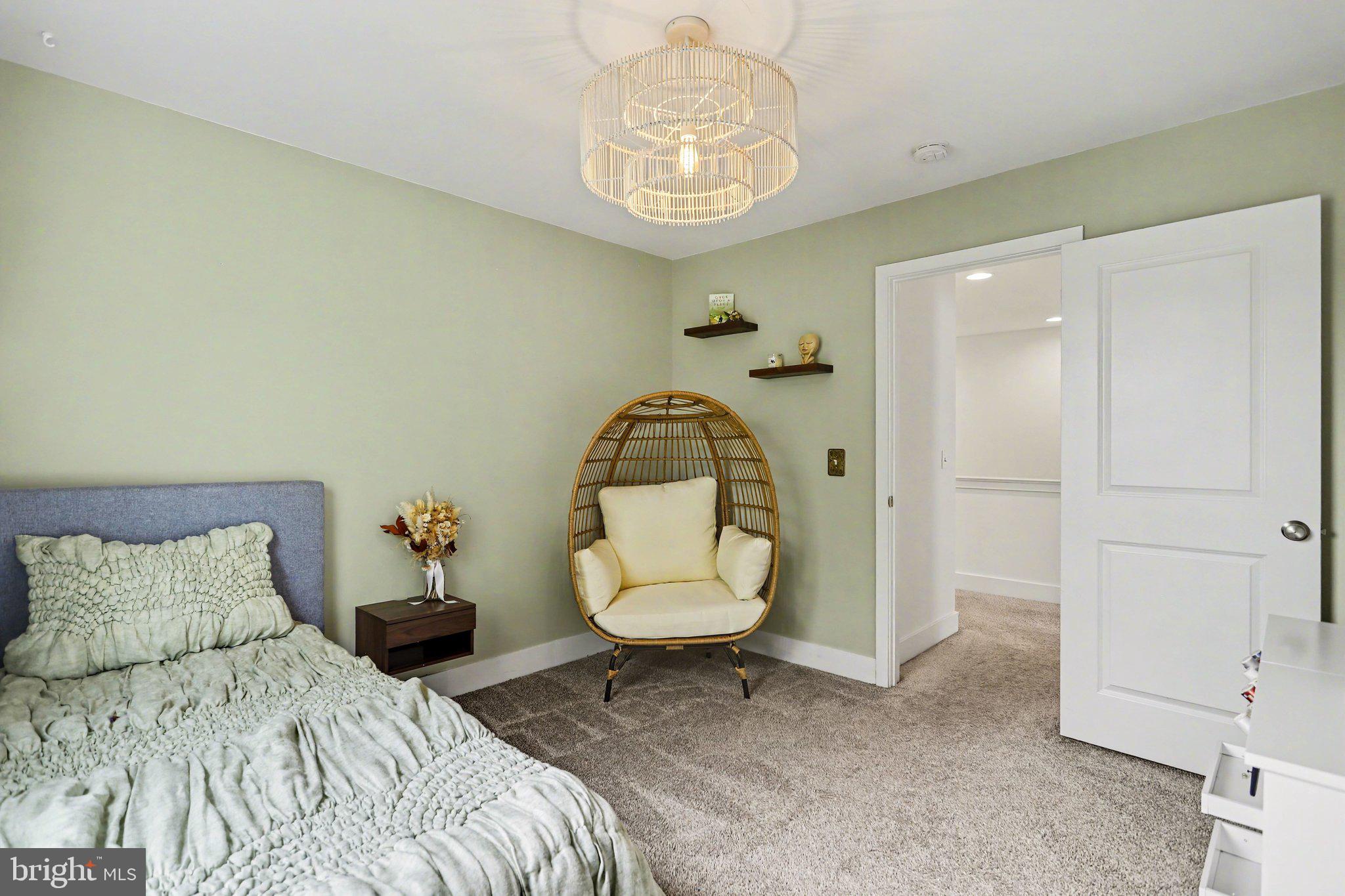 401 Wendover Way Lancaster, PA 17603 - Photo 23 of 45 a bedroom with a bed and a chandelier