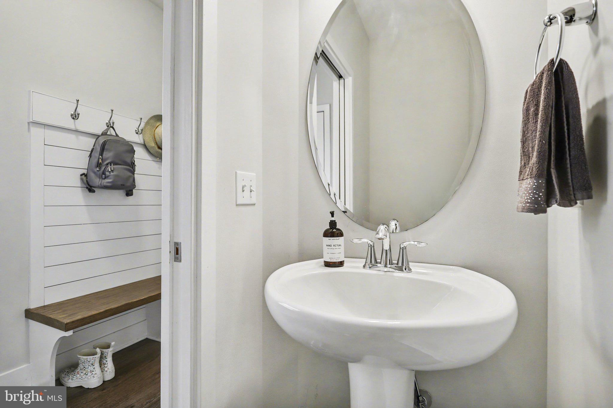 401 Wendover Way Lancaster, PA 17603 - Photo 32 of 45 a bathroom with a sink and a mirror