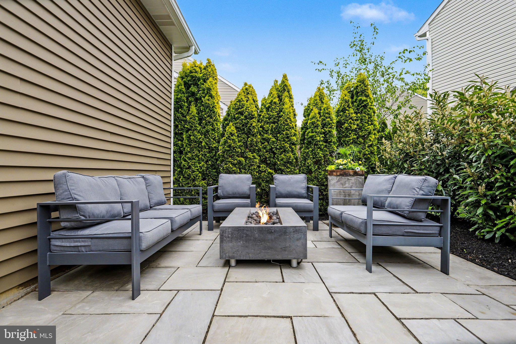 401 Wendover Way Lancaster, PA 17603 - Photo 36 of 45 a outdoor space with patio couches and a potted plant