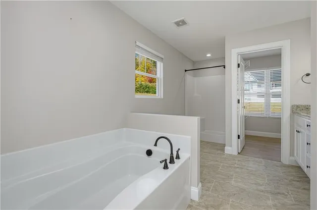 a view of a kitchen with a refrigerator a stove top oven and a dishwasher
