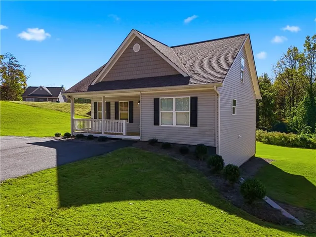 a house view with a garden space