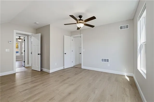 a picture of a bathroom with a shower