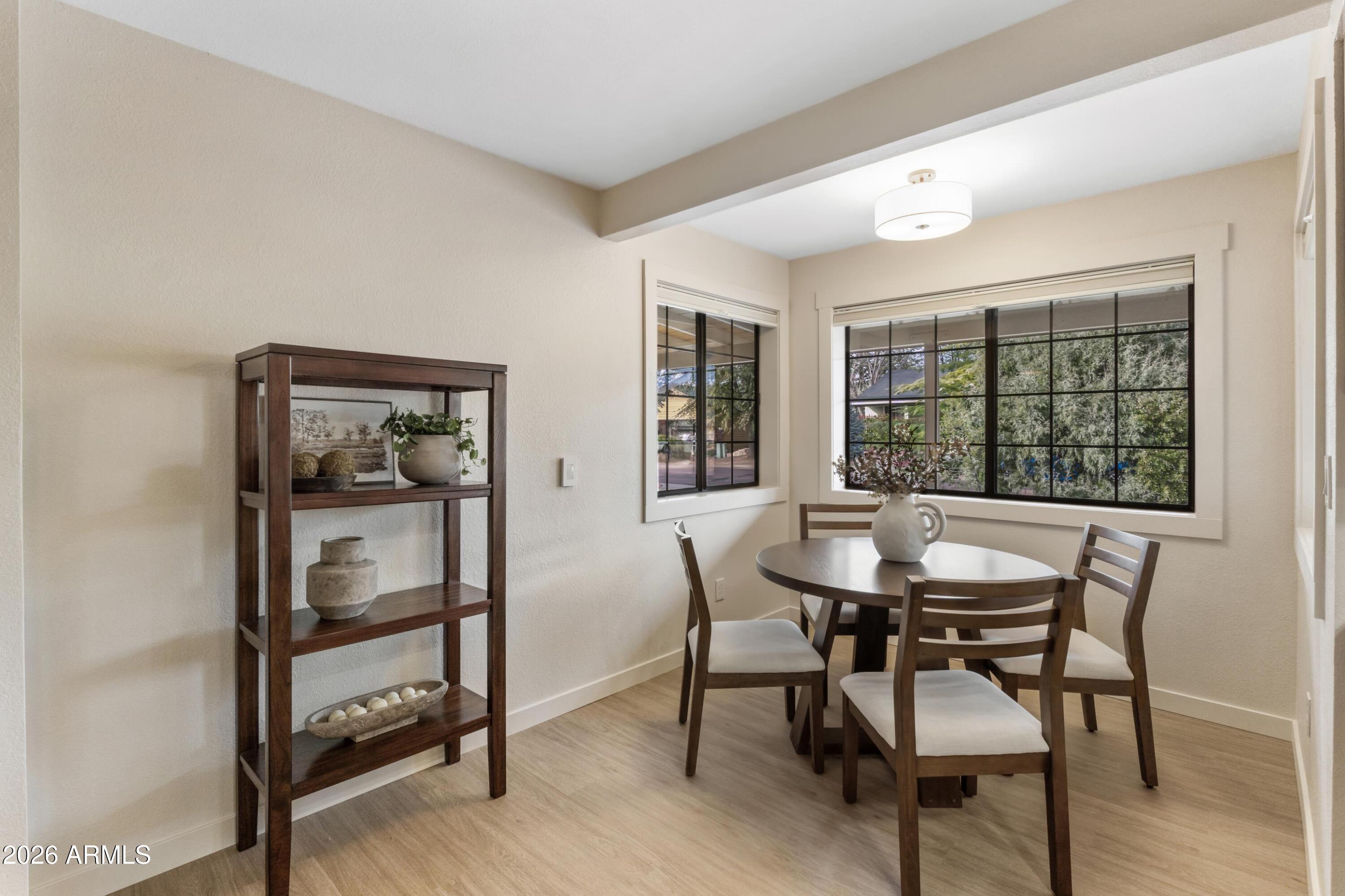 603 East Amarillo Circle Payson, AZ 85541 - Photo 12 of 54 a view of a dining room with furniture and a window