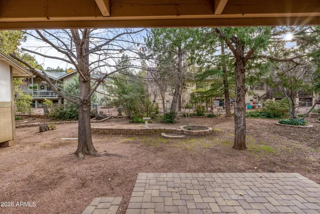 a view of a house with a yard and garage