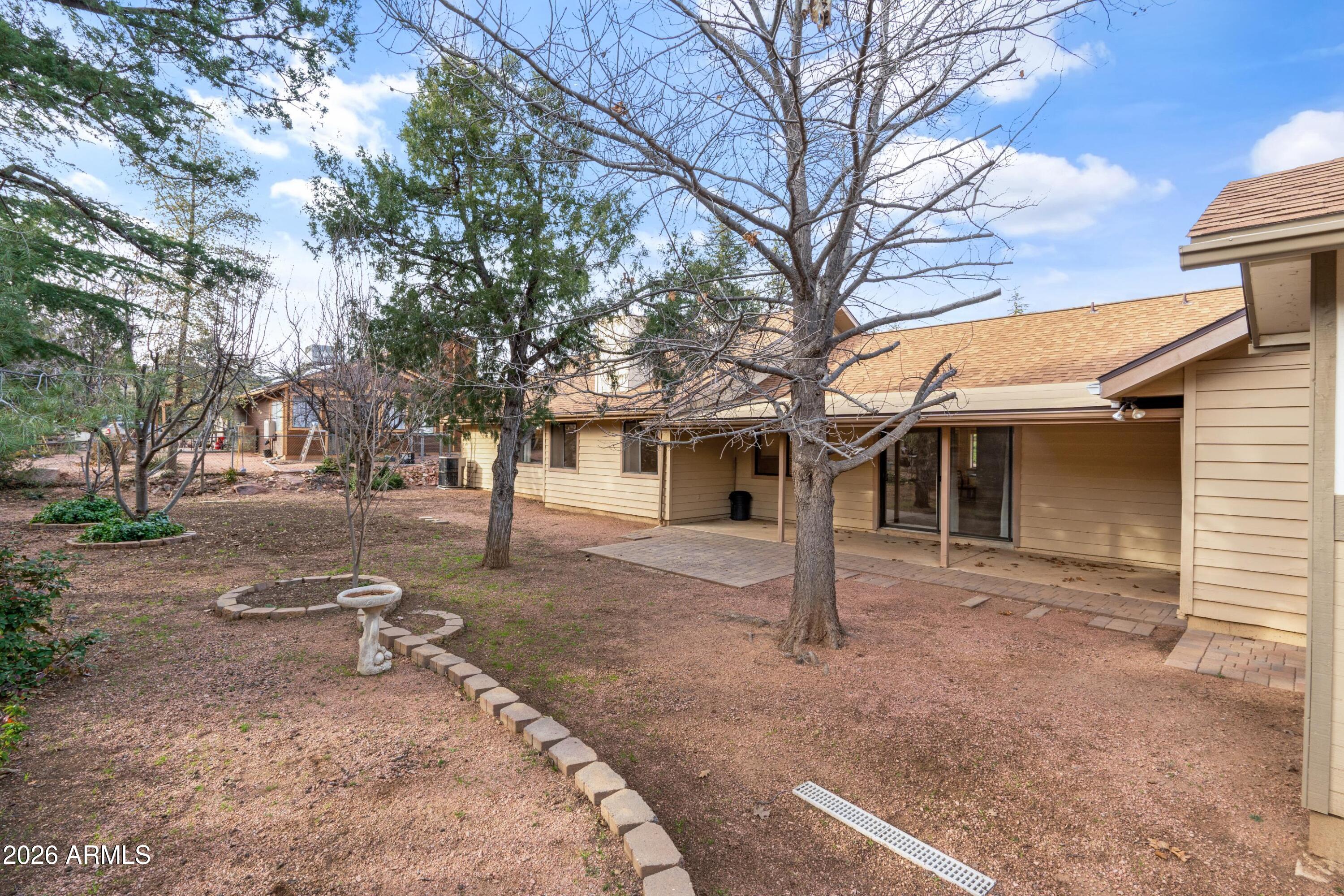 603 East Amarillo Circle Payson, AZ 85541 - Photo 26 of 54 a view of a house with a backyard