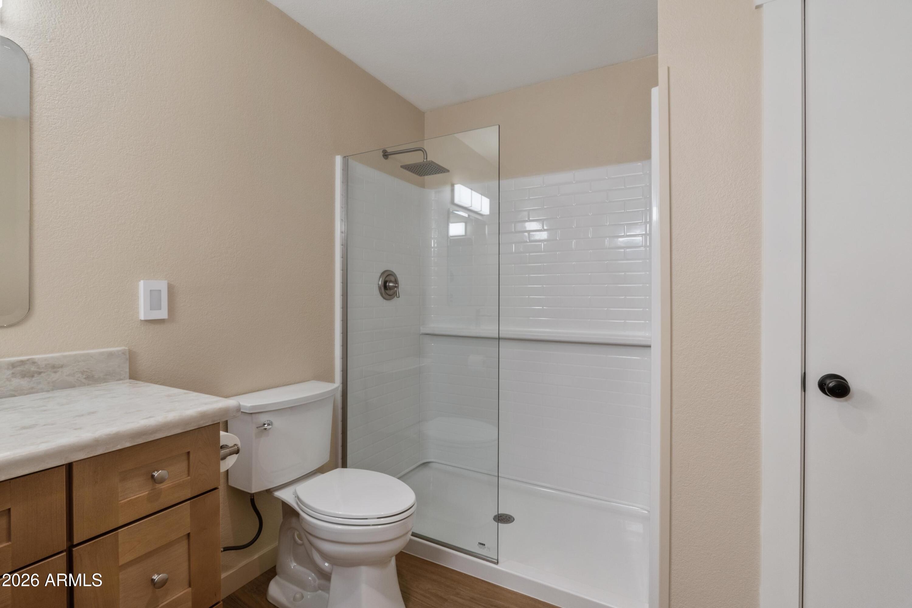 603 East Amarillo Circle Payson, AZ 85541 - Photo 38 of 54 a bathroom with a sink toilet and shower