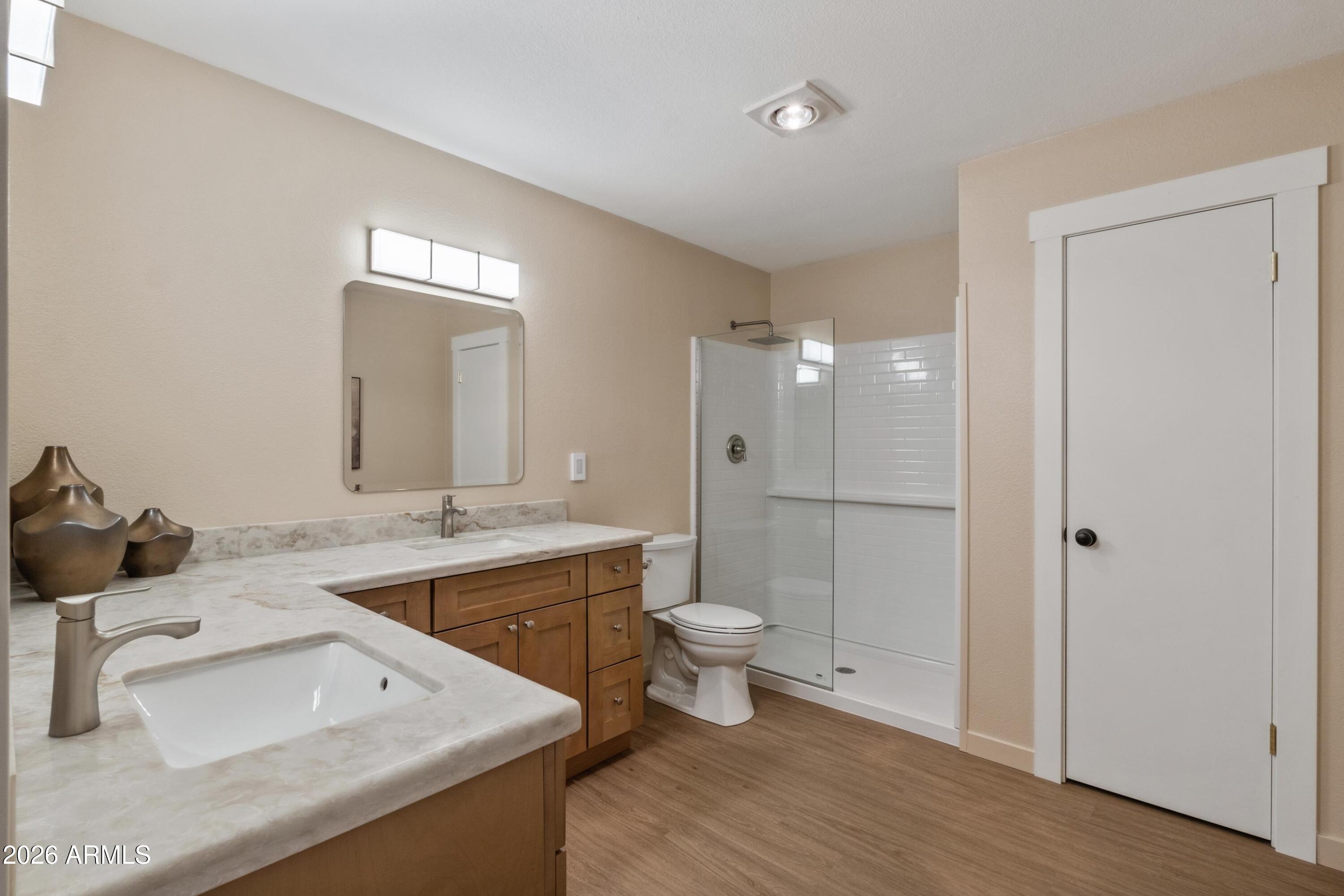 603 East Amarillo Circle Payson, AZ 85541 - Photo 39 of 54 a bathroom with a sink a toilet and shower