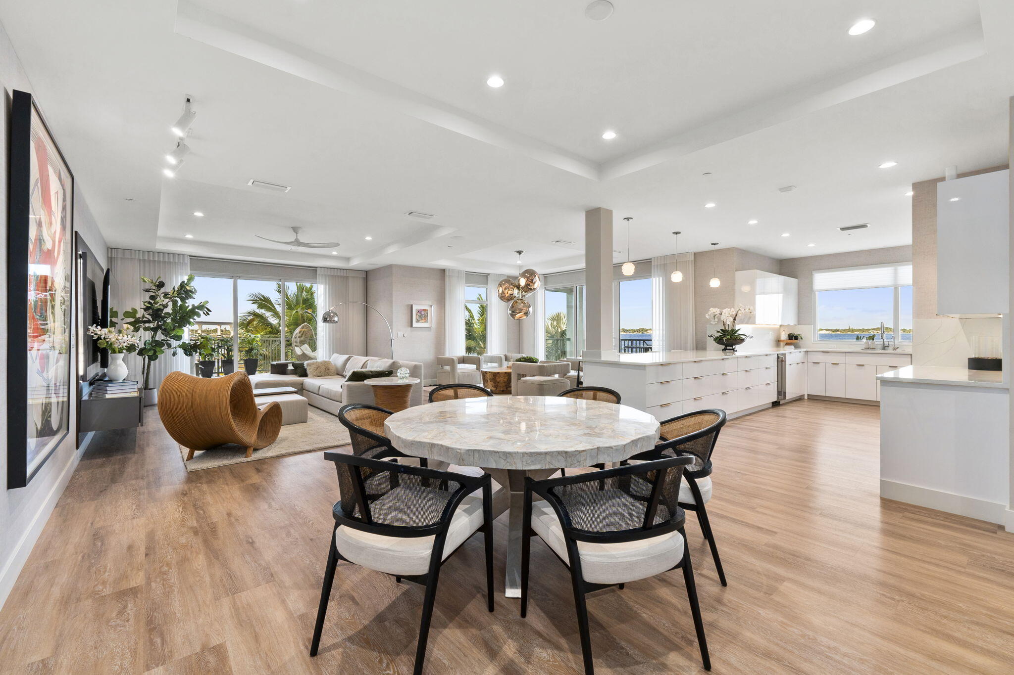 41 Southwest Seminole Street, Unit 206 Stuart, FL 34994 - Photo 14 of 72 a view of a dining area with furniture and wooden floor