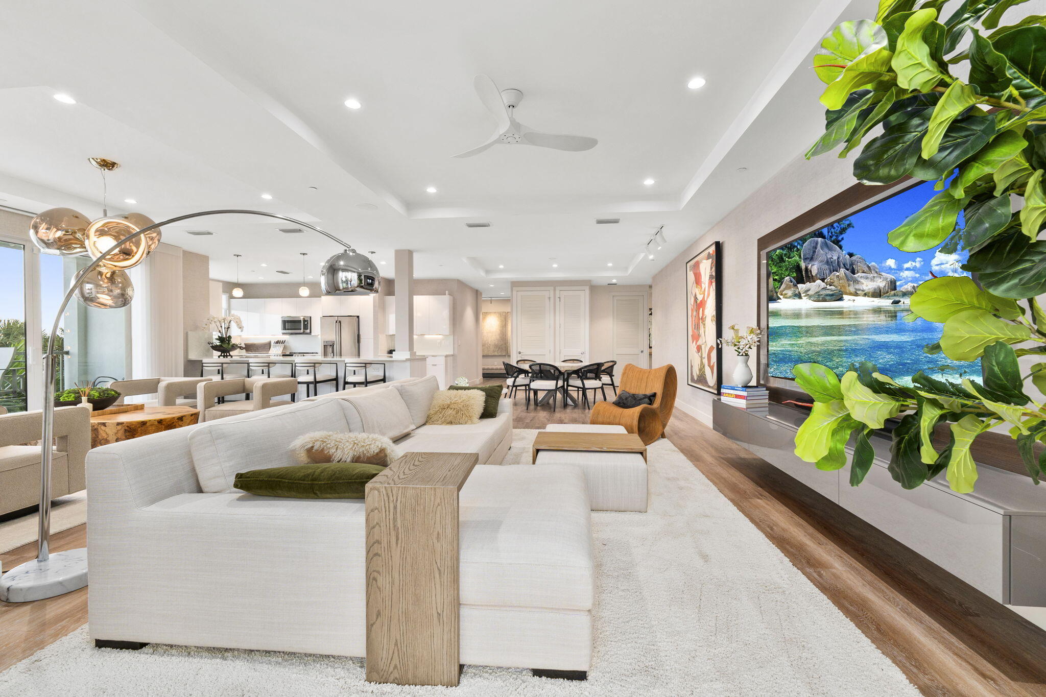 41 Southwest Seminole Street, Unit 206 Stuart, FL 34994 - Photo 16 of 72 a living room with furniture and a large window