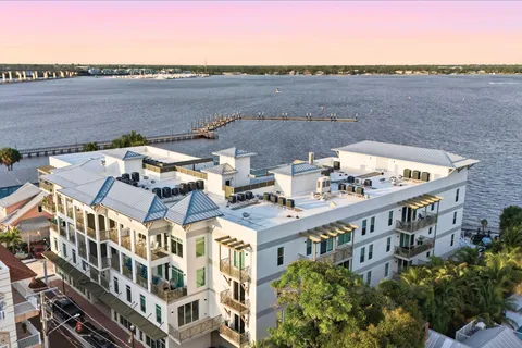 a view of a lake with building in front of it