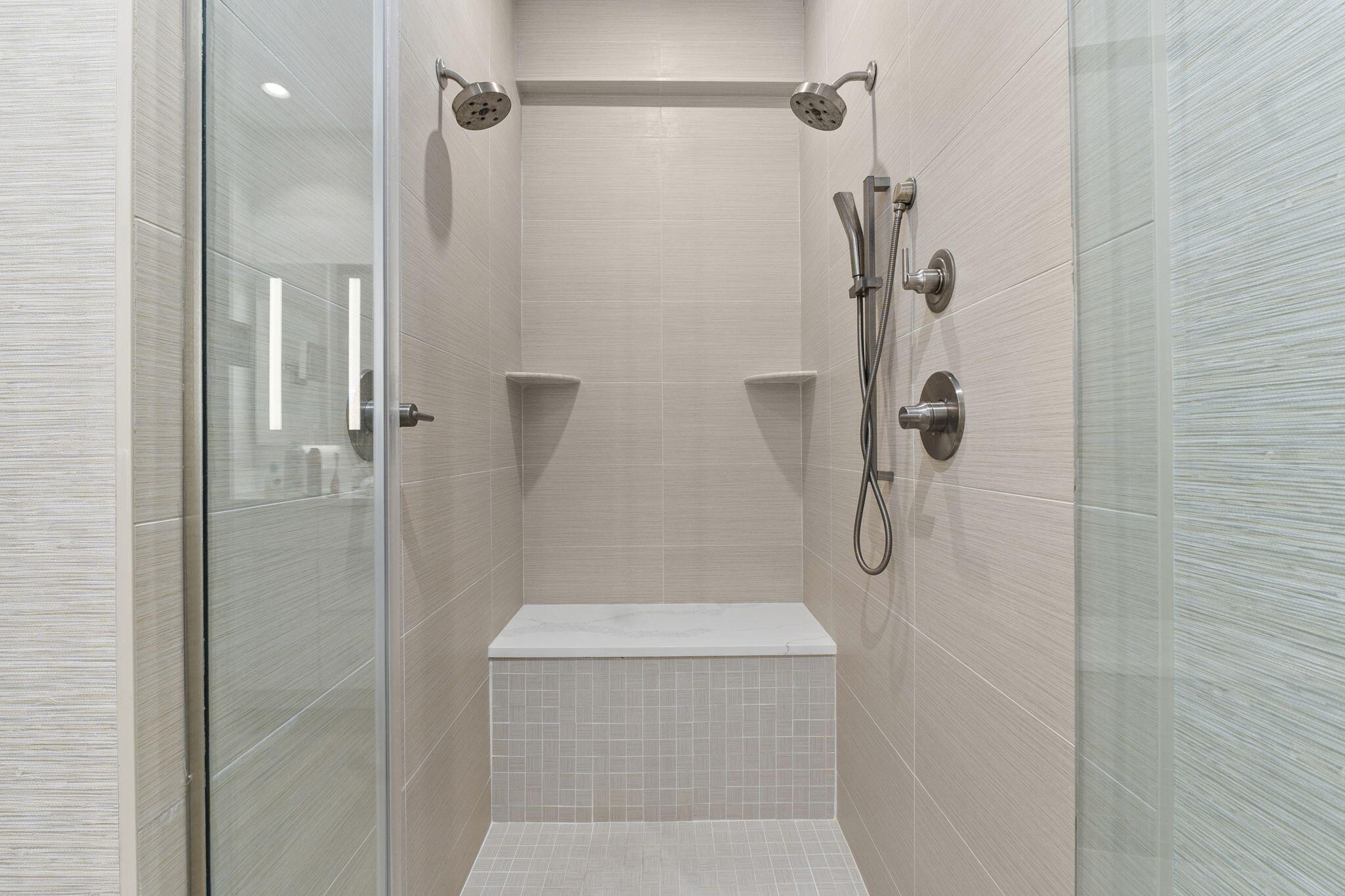 41 Southwest Seminole Street, Unit 206 Stuart, FL 34994 - Photo 43 of 72 a bathroom with a shower