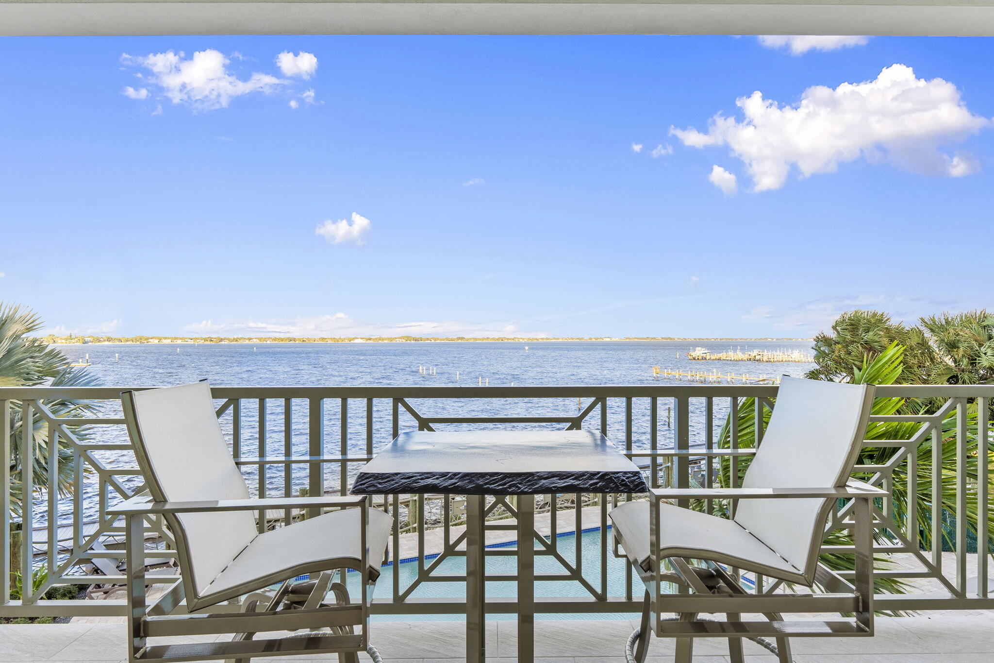 41 Southwest Seminole Street, Unit 206 Stuart, FL 34994 - Photo 5 of 72 a view of a balcony with furniture