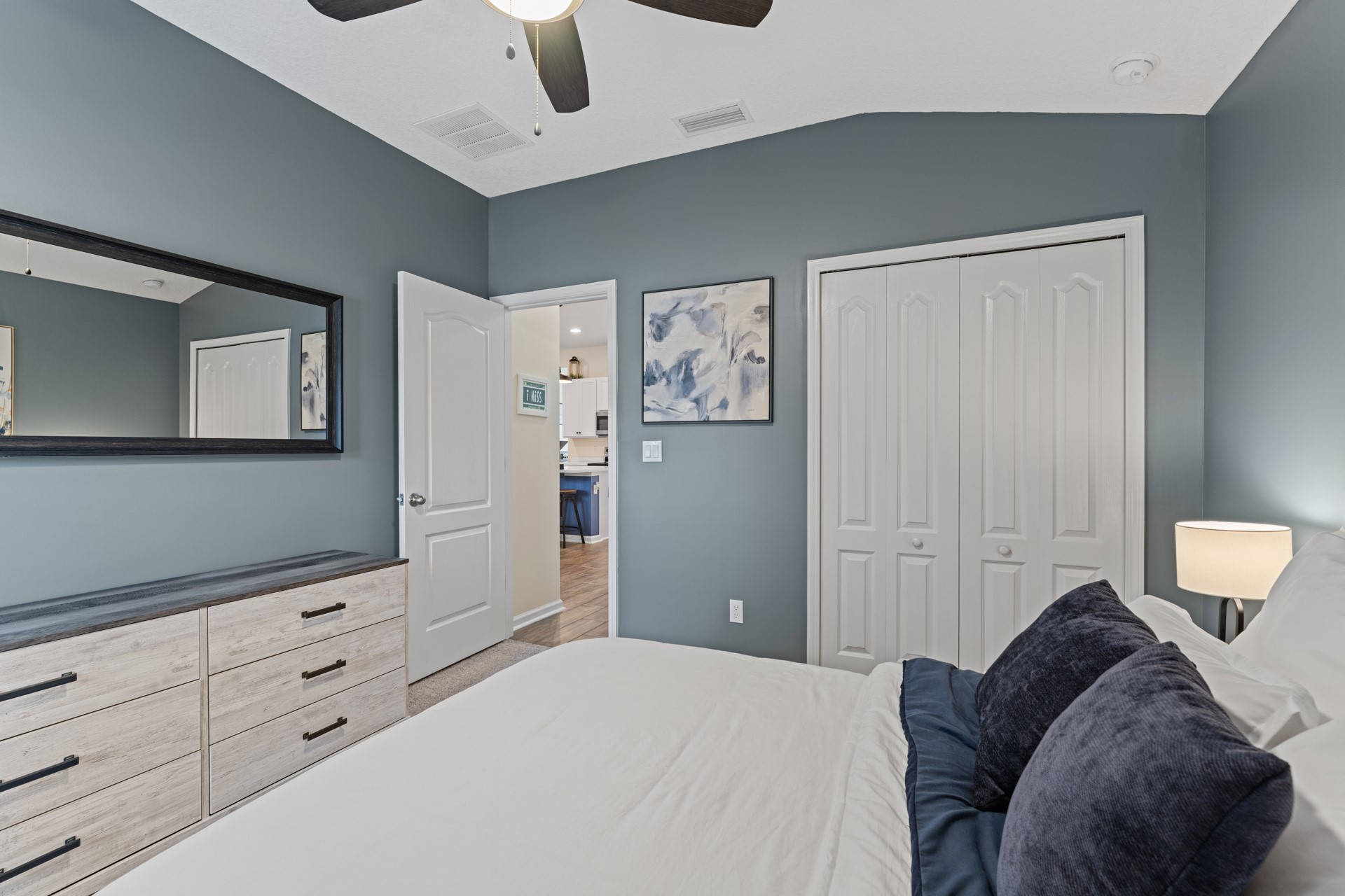 86645 Lazy Lake Circle Yulee, FL 32097 - Photo 24 of 44 a bedroom with a bed and cabinets