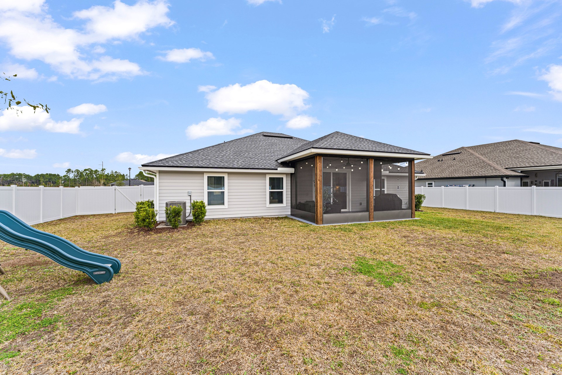 86645 Lazy Lake Circle Yulee, FL 32097 - Photo 35 of 44 a view of a house with backyard and trees