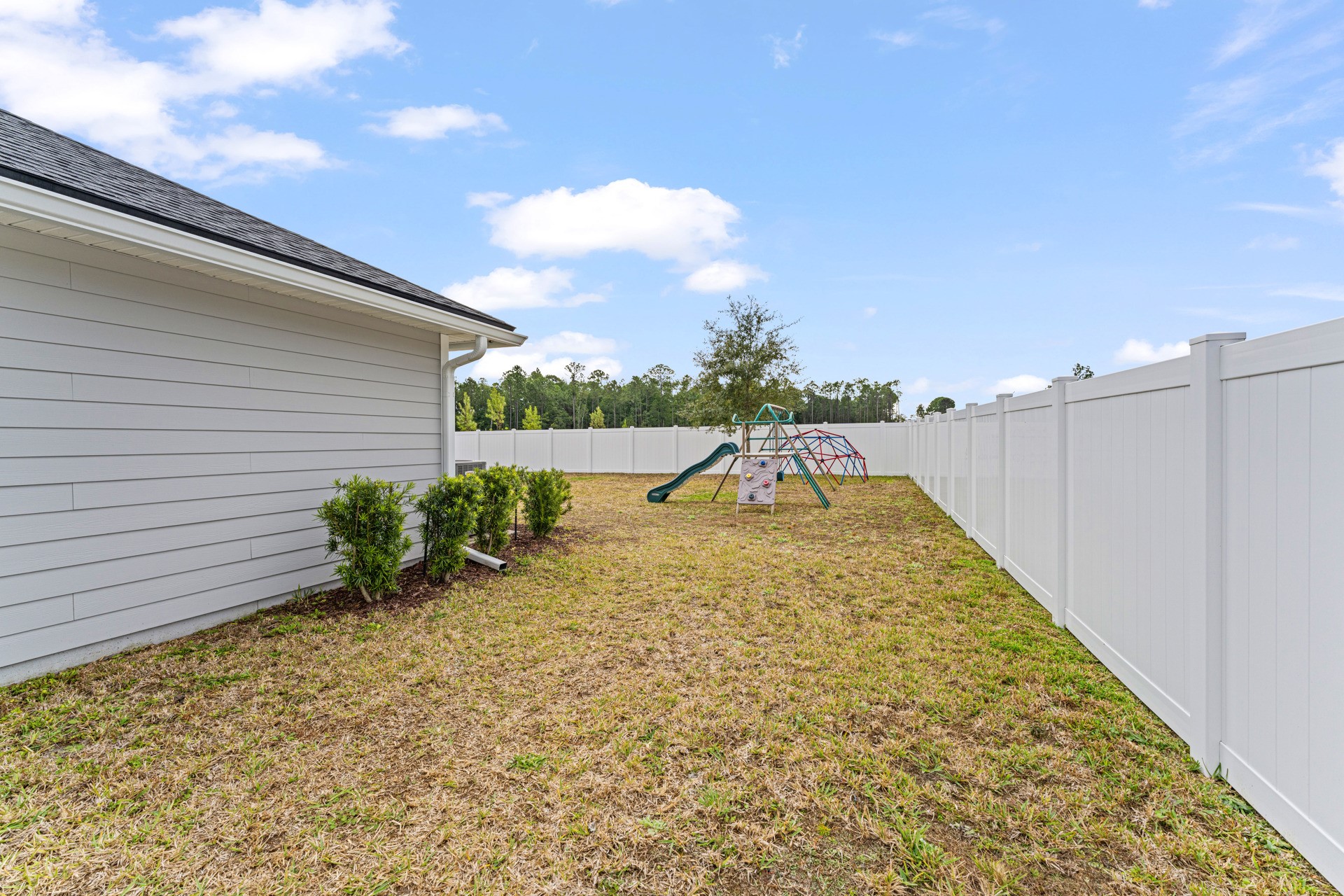 86645 Lazy Lake Circle Yulee, FL 32097 - Photo 38 of 44 a view of a backyard