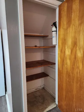 a kitchen with a sink and a microwave
