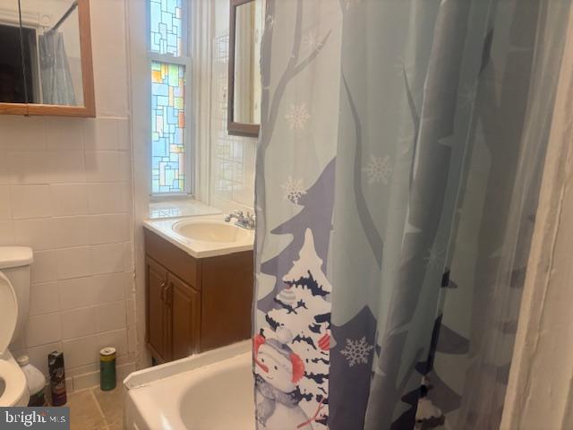 5630 Walnut Street, Unit 2 Philadelphia, PA 19139 - Photo 8 of 28 a bathroom with a sink and toilet