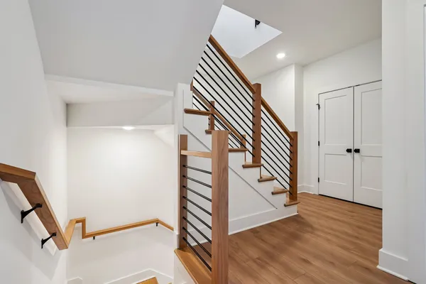 an entryway in a hall with a window