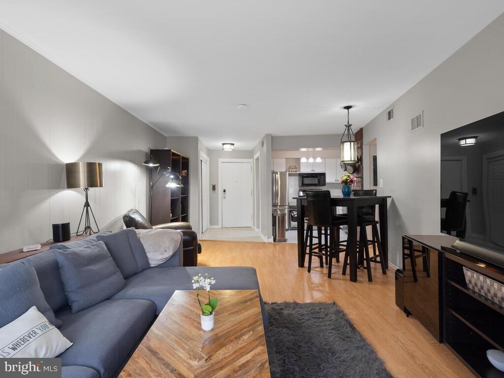 5808 Royal Ridge Drive, Unit W Springfield, VA 22152 - Photo 12 of 28 Spacious light filled living/dining room
