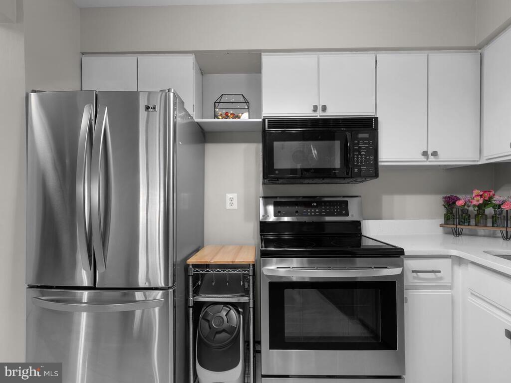 Updated kitchen with stainless steel appliances