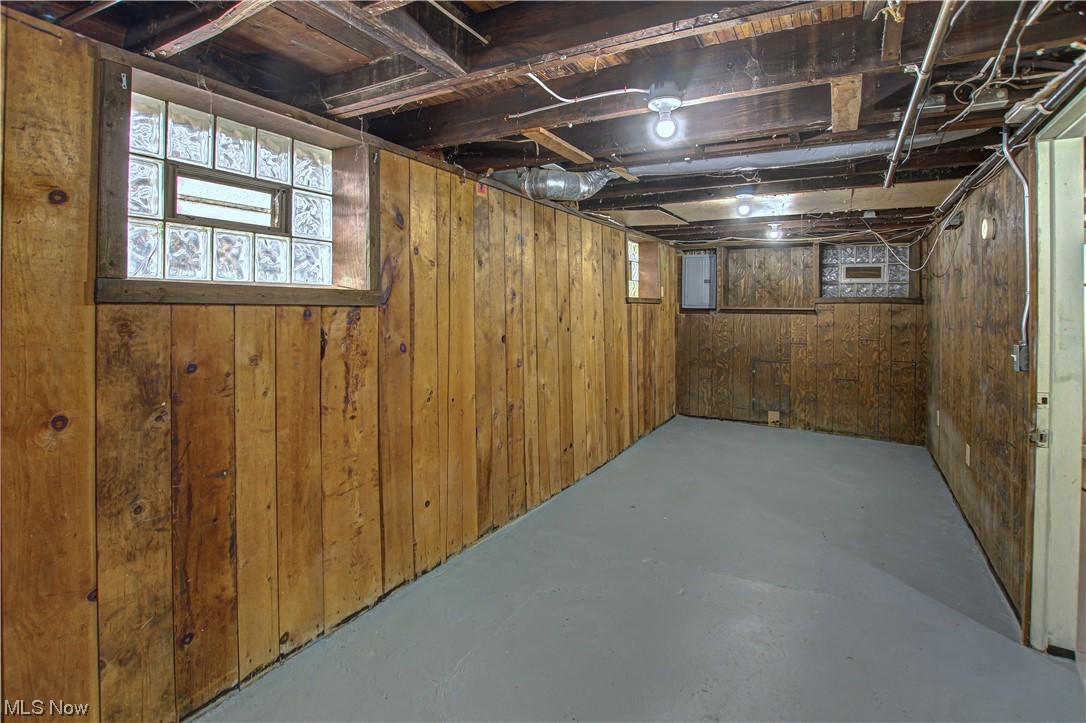 4764 Rockwood Road Cleveland, OH 44125 - Photo 22 of 35 Basement with wood walls