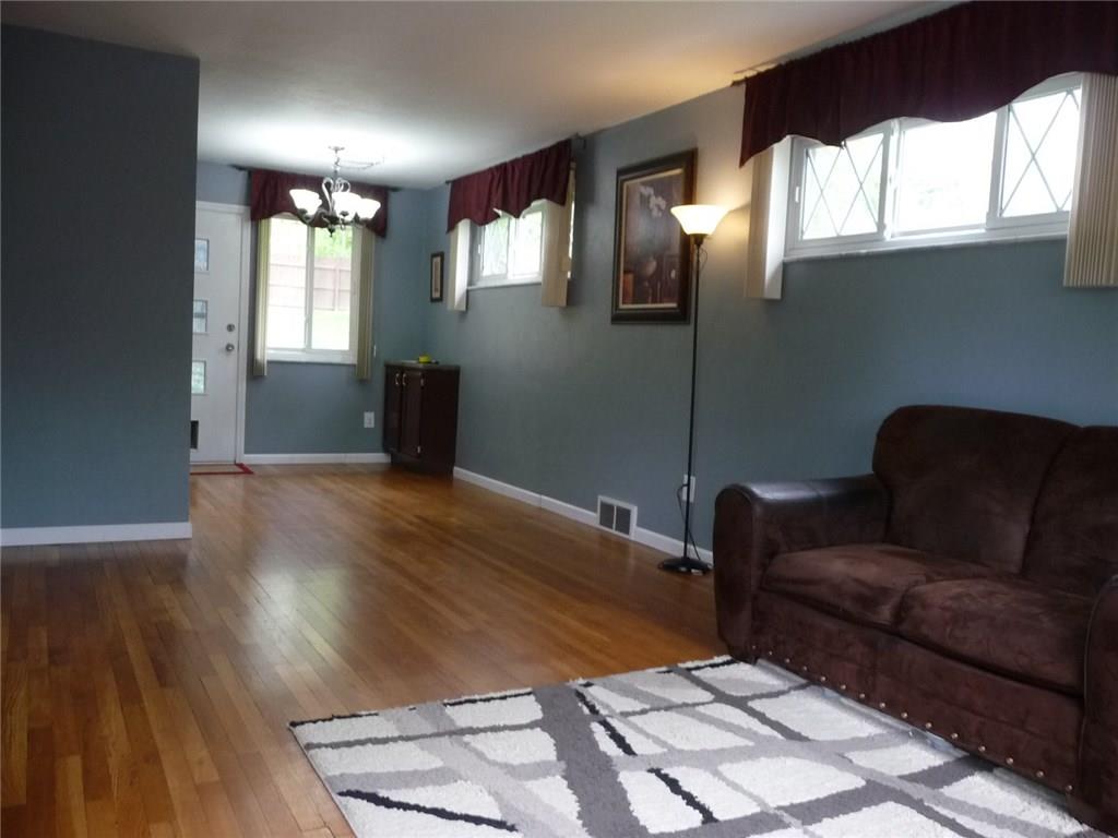 700 Long Road Penn Hills, PA 15235 - Photo 3 of 21 Hardwood floors throughout on first floor. Very open feel for this living area.
