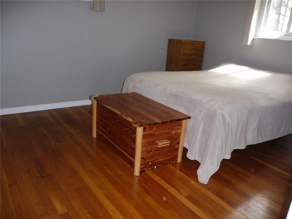 700 Long Road Penn Hills, PA 15235 - Photo 8 of 21 Master Bedroom. Notice the beautiful hardwood.