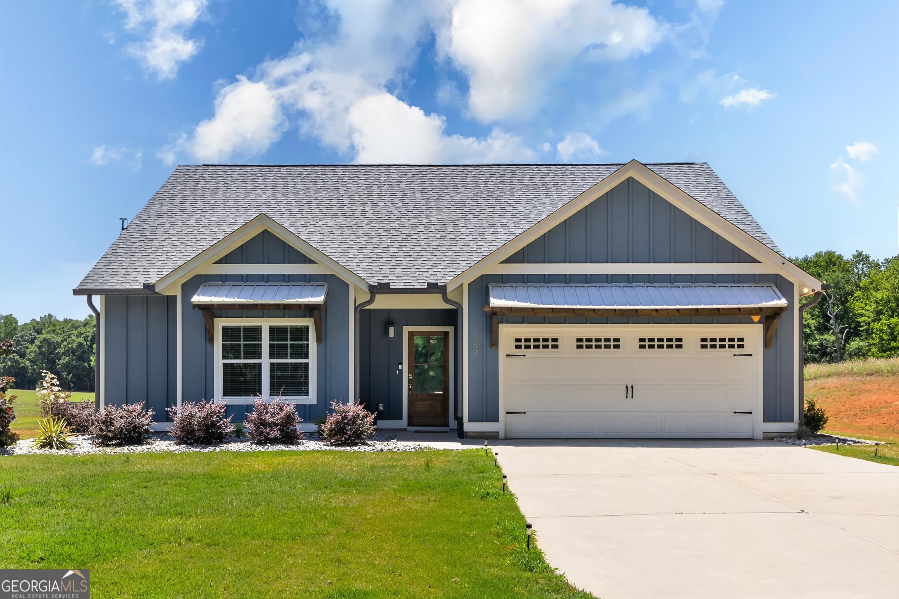 1350-c O Draper Road Comer, GA 30629 - Photo 2 of 47 a front view of house with yard