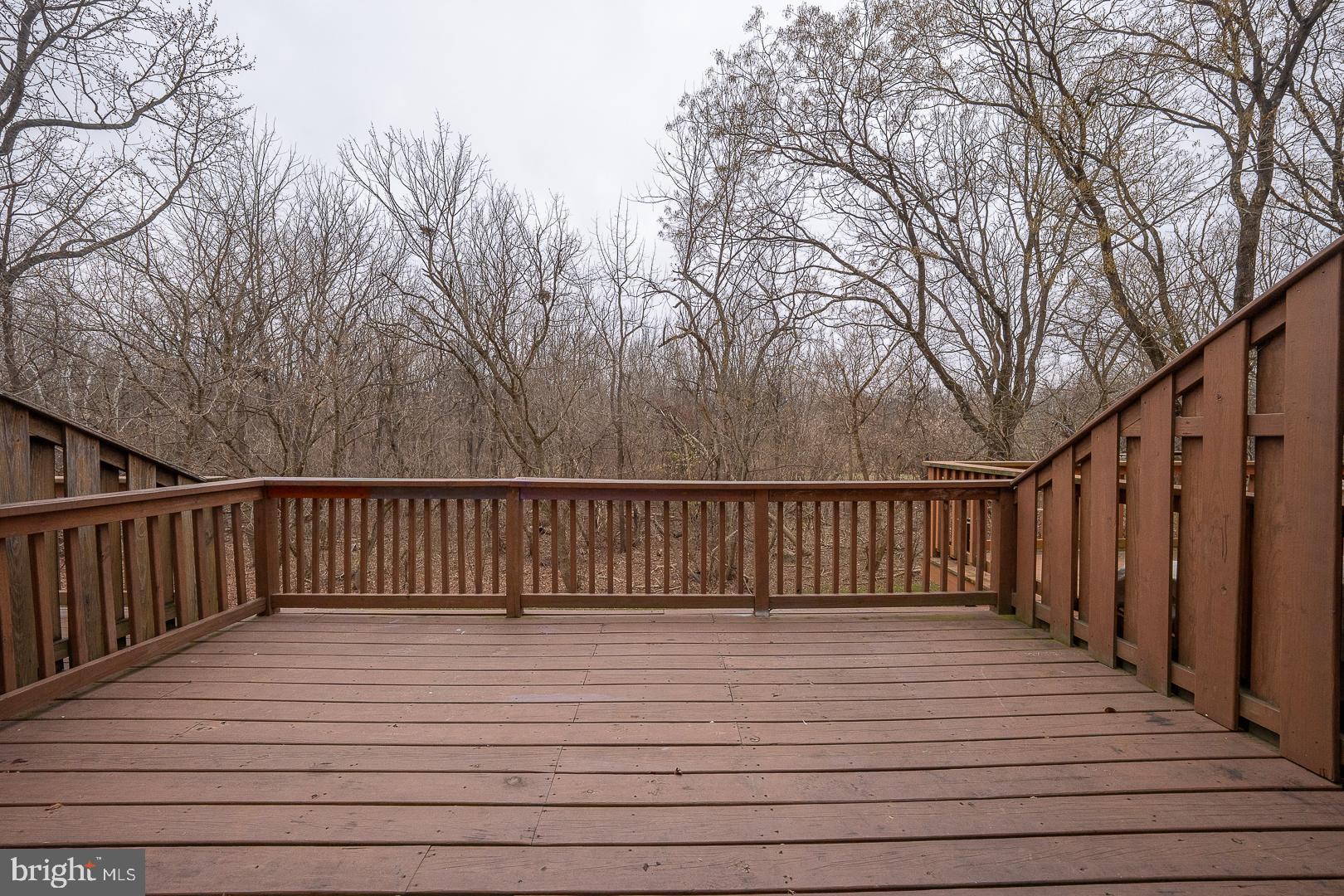 26 Rampart Drive Chesterbrook, PA 19087 - Photo 11 of 39 Private Deck off Dining Area overlook woods