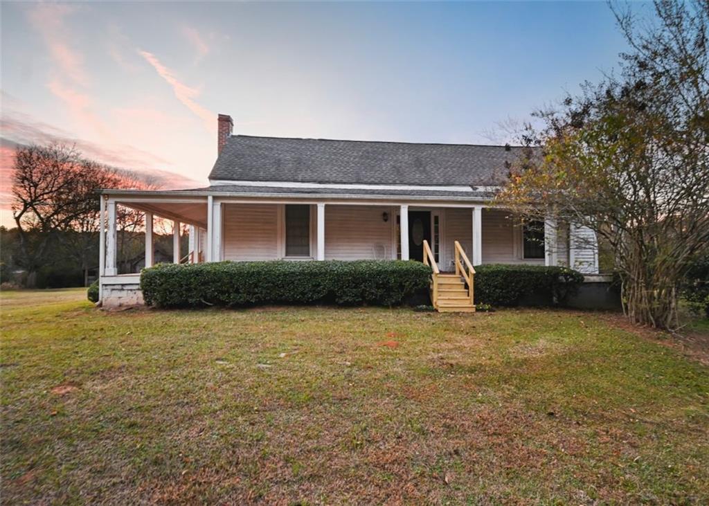 4000 Bostwick Road Madison, GA 30650 - Photo 14 of 34 a front view of a house with yard