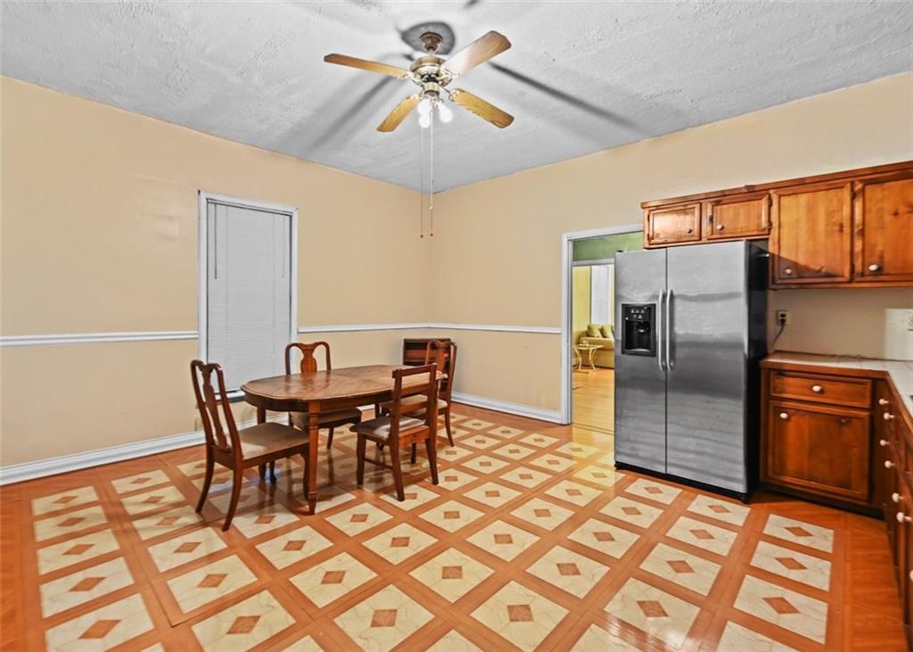 4000 Bostwick Road Madison, GA 30650 - Photo 22 of 34 a view of a dining room with furniture