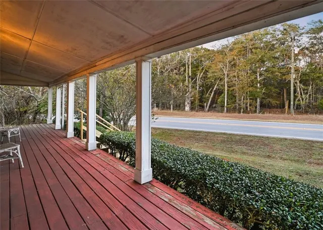 a view of a room with wooden floor and wooden floor